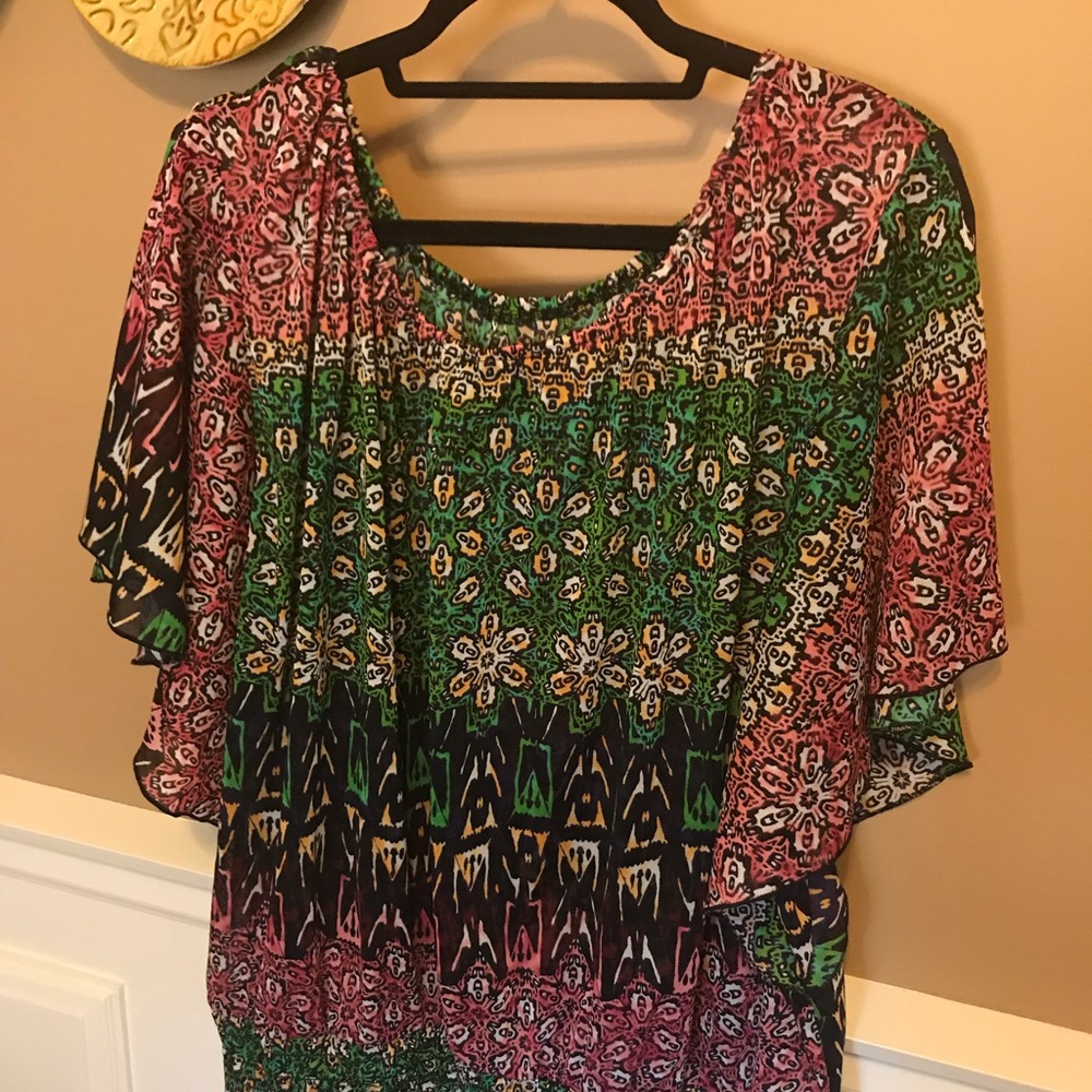 Flower print top with elastic at waist.